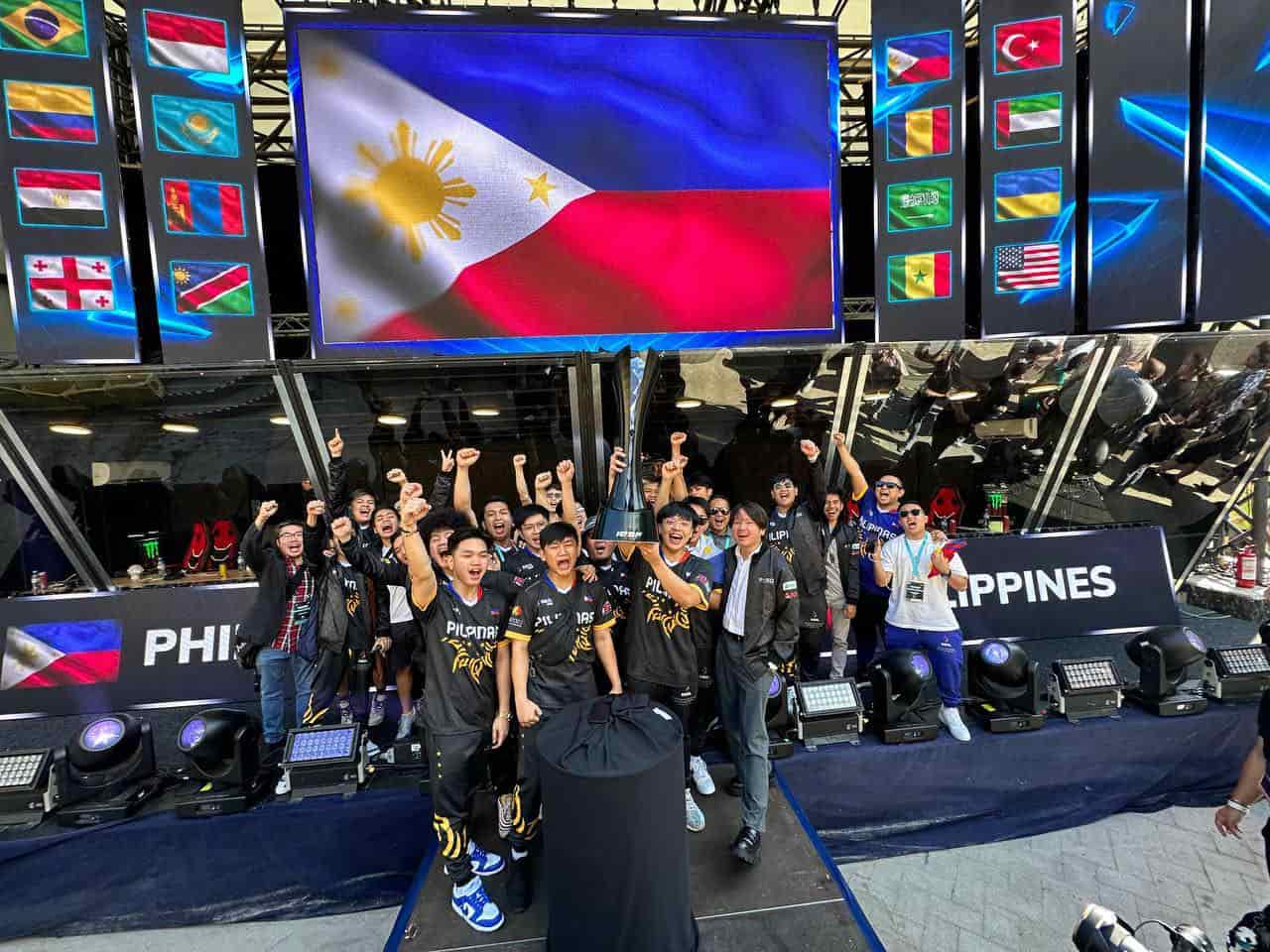 Sibol celebrated after winning the mlbb trophy in the iesf wec 2023