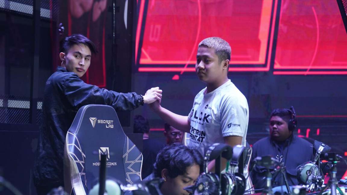 Blacklist International's Renejay (left) and Yue (right) exchanging high fives.