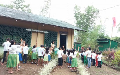 Learners of the Busog Primary School during their flag-raising ceremony in an undated photo. 