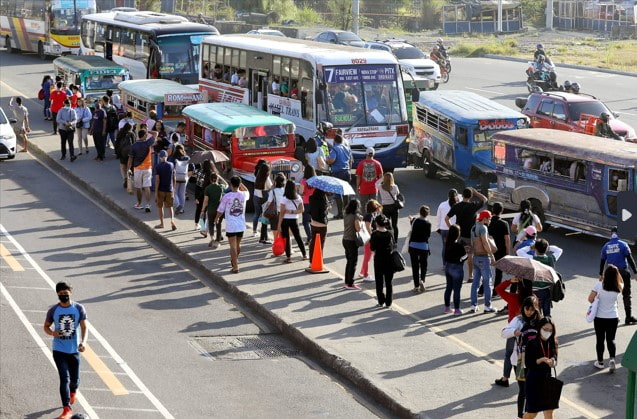 Commuters on the side of the road