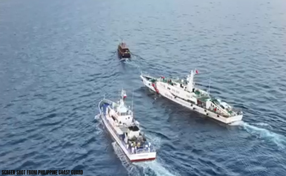 Two China Coast Guard vessels and a Philippine vessel.