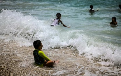 Children enjoy a no-class day at Cantaan white beach in Guinsiliban, Camiguin